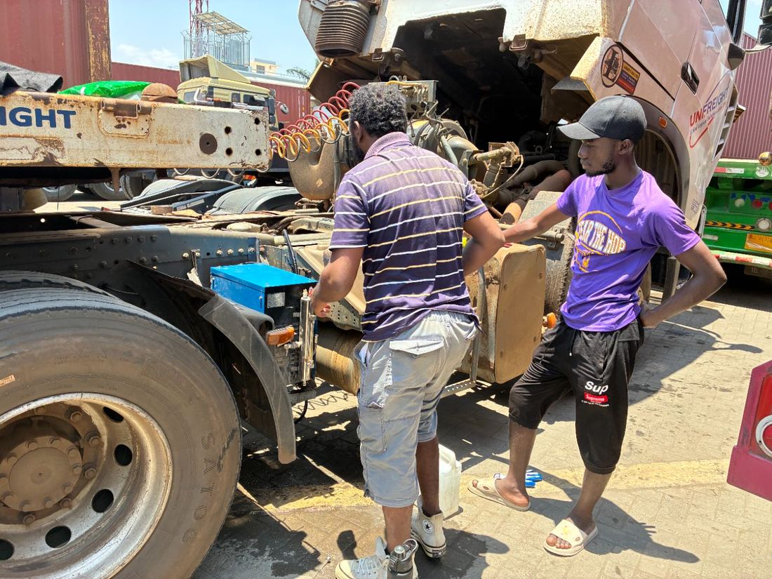 KAS technicians mounting the unit on a truck chassis
